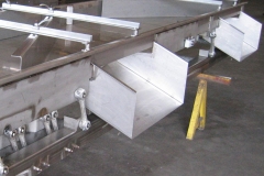 Bottom-side outlets with diverters